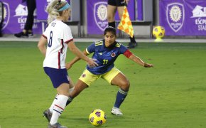 Colombia forward Catalina Usme (11) guards against the United States midfielder Julie Ertz