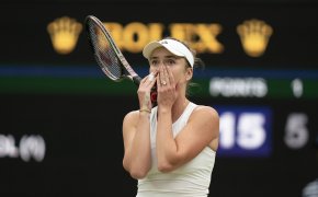 Elina Svitolina reacts after upsetting #1 seed Iga Swiatek in the Wimbledon QF
