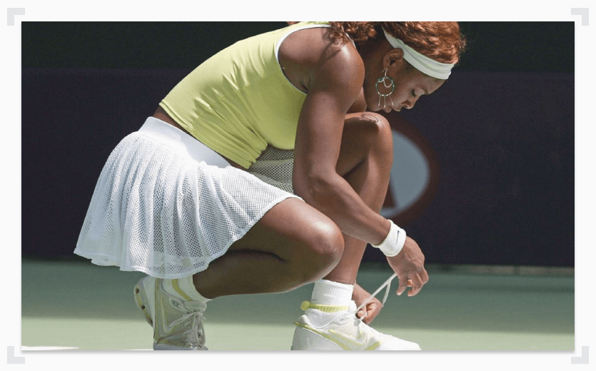 Serena Williams socks and tying shoes
